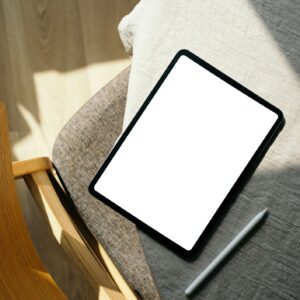Gap Year Movement digital planner/workbook cover mockup on tablet in warm neutral workspace